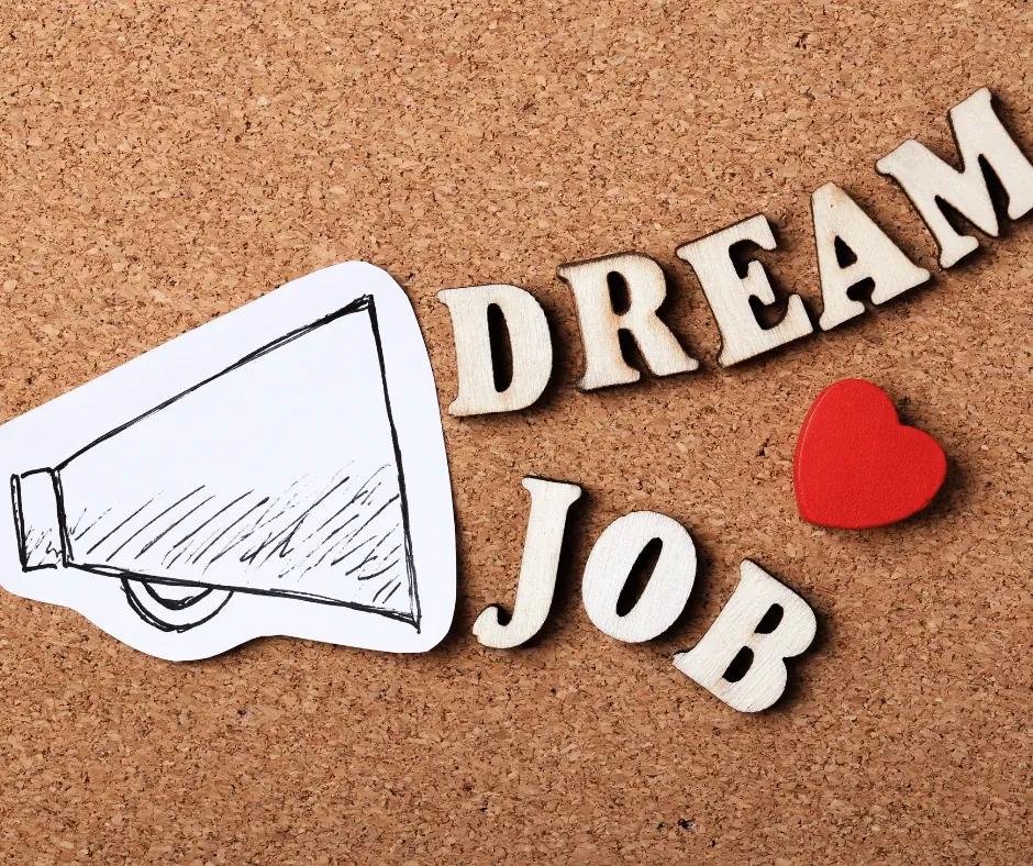 Career coach organising resume samples and examples on a desk.