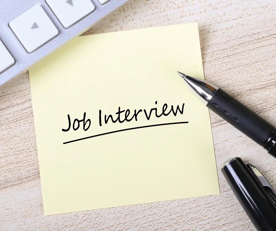 Career coach reviewing top resumes samples with a client.